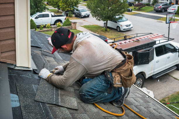 Professional Roofing technician working in Milford, IA